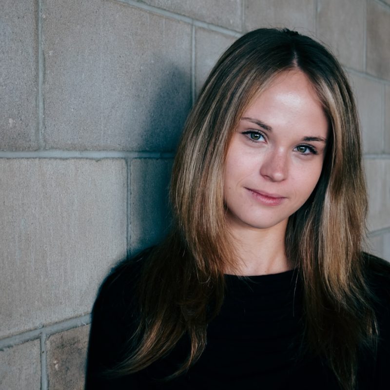 A natural, unretouched portrait in soft daylight